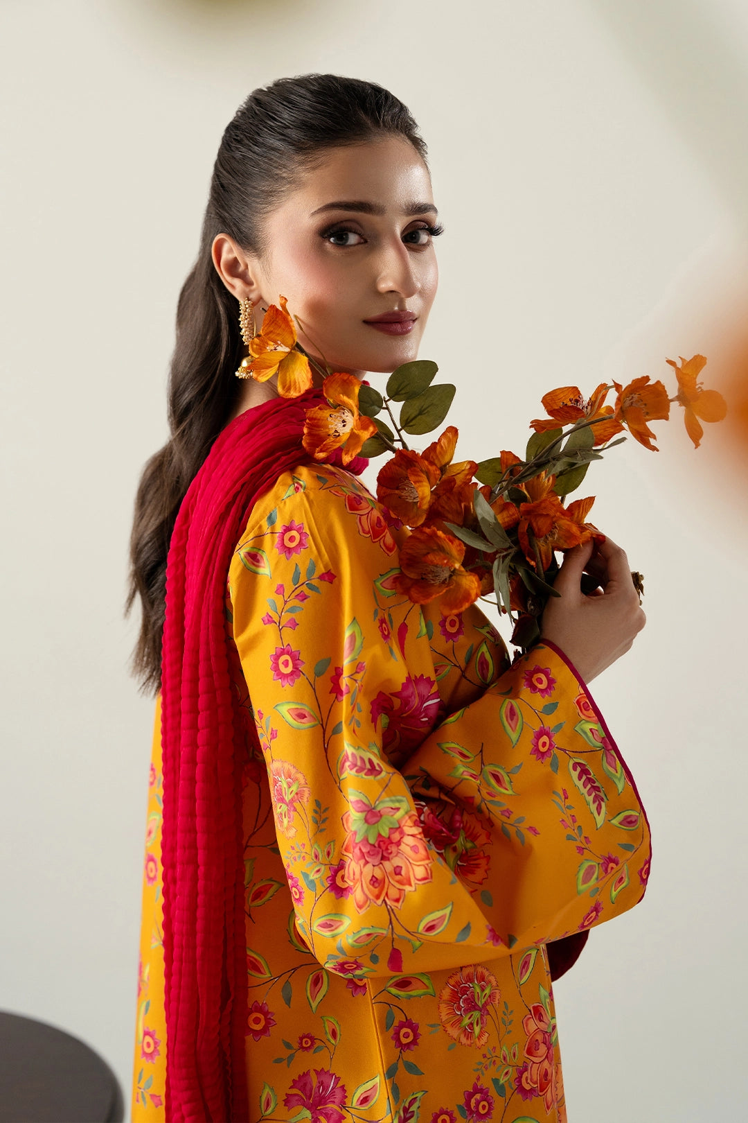 MUSTARD SHORT ANGRAKHA WITH FLARED PANTS AND CHUNRI DUPATTA