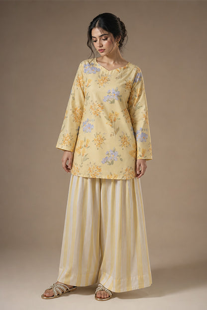 BUTTER YELLOW PRINTED KURTI WITH CORSET BACK AND FARSHI SHALWAR